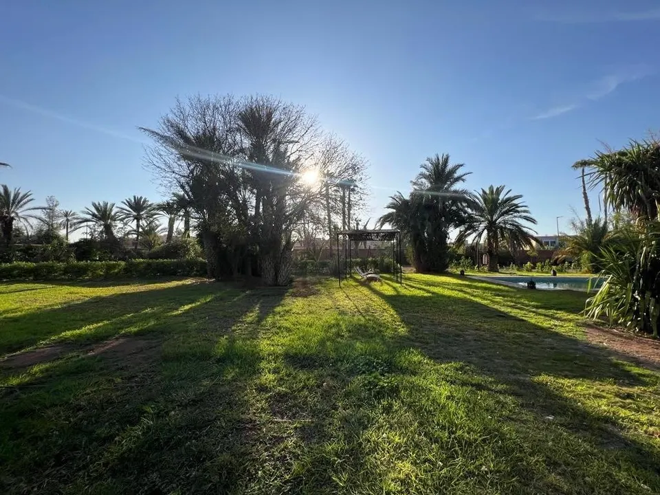 Villa con piscina y jardín de palmeras, Marrakech